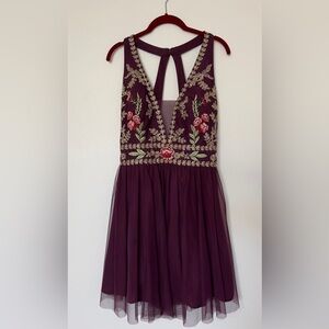 Beautiful burgundy dress. Elegant fun with open back